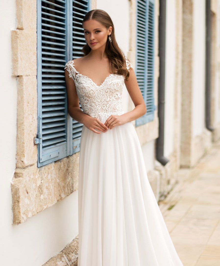 Model wearing a Monica loretti dress
